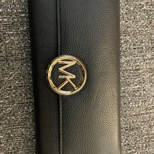 Michael Kors bag and matching wallet.